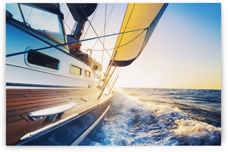 sailing into the sunset by PacificStock